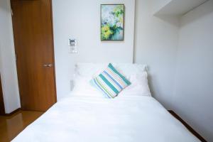 walk to Higahsi Shinjuku sta. SIoQ-2