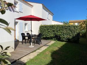 Maisons de vacances Le Village des Amareyeurs - Ile d'Oleron - Maison classee 3 etoiles avec piscine : photos des chambres