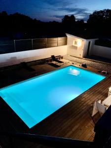 Maisons de vacances Maison au calme avec piscine : photos des chambres