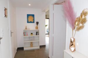 Appartements T2 Art de vivre cozy air-conditioned with swimming pool : photos des chambres