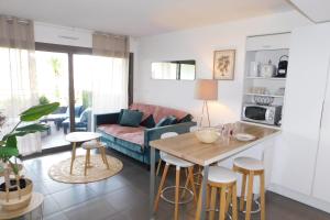 Appartements T2 Art de vivre cozy air-conditioned with swimming pool : photos des chambres