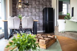 Penthouse Wohnung mit Terrasse & Sauna - Wildecker Ferienbutze