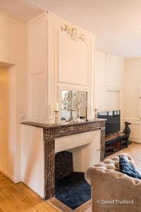 Appartements Suites Mana - MATAHINA avec VUE SUPERBE sur la Place DUCALE et Parking prive inclus : photos des chambres