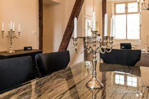 Appartements Suites Mana - MATAHINA avec VUE SUPERBE sur la Place DUCALE et Parking prive inclus : photos des chambres