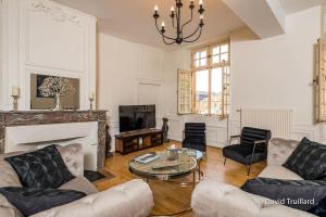 Appartements Suites Mana - MATAHINA avec VUE SUPERBE sur la Place DUCALE et Parking prive inclus : photos des chambres