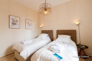 Appartements Suites Mana - MATAHINA avec VUE SUPERBE sur la Place DUCALE et Parking prive inclus : photos des chambres