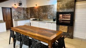 Casa Pé na Areia com Piscina Climatizada