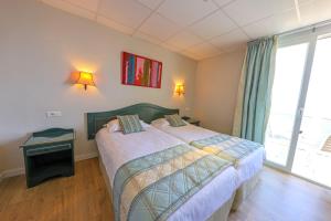 Hotels Hotel Saint Christophe : photos des chambres