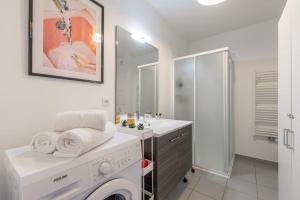 Appartements Studio entre Disney, Paris et Aeroport Charles de Gaulle - Parking souterrain gratuit : photos des chambres