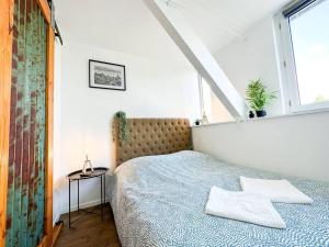 Appartements NEW : Lumiere & Confort face a la GARE : photos des chambres