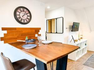 Appartements NEW : Lumiere & Confort face a la GARE : photos des chambres