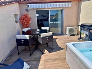 Appartements Serenite - Superbe Terrasse et Jacuzzi ! : photos des chambres