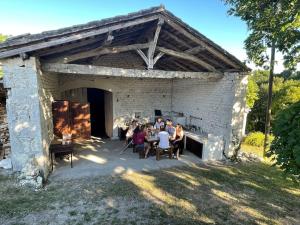 Maisons de vacances Magnifique ferme renovee et sa piscine ecologique : photos des chambres