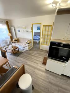 Appartements Logement cosy, situe entre ciel et mer : photos des chambres