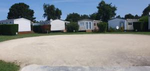 Campings Mobil home Luxueux - 40 m2 terrasse couverte - La Palmyre Les Mathes - Les Charmettes 4 etoiles : photos des chambres