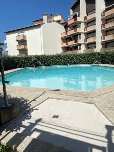 Appartements Logement port de plaisance, terrasse Sud, piscine : photos des chambres