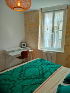Appartements Logement Cosy entre Vigne&Ocean : photos des chambres