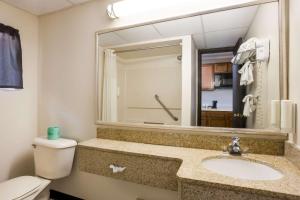 Quadruple Room with Two Queen Beds - Disability Access/Non Smoking room in Suburban Studios Millville