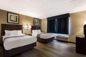 Quadruple Room - Non Smoking/Exterior Corridor room in Suburban Studios Millville