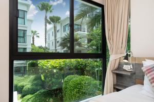 New Apartment TTL B209 in New Rawai Beach Residence with Tropical Pools