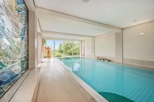 Wellness-Apartment mit Wasserblick, Pool, Sauna & Fitnessbereich - Liepe