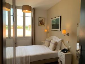 Hotels Hotel La Villa des Oliviers : photos des chambres