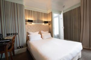 Hotels Le Grand Hotel : photos des chambres