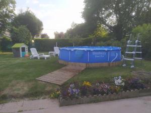 Maisons de vacances maison espaces vert et piscine : photos des chambres