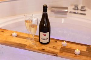 Appartements Suite love Jacuzzi : photos des chambres