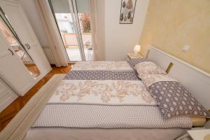 Apartments with parking space Palit, Rab - 4970