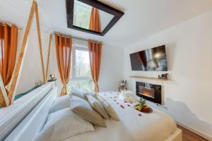 Appartements Suite love Jacuzzi : photos des chambres