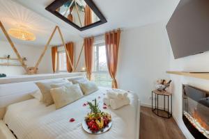 Appartements Suite love Jacuzzi : photos des chambres