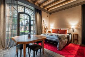 Appartements La Petite Ecurie : photos des chambres