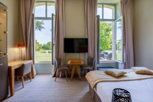 Hotels Hotel et SPA du Chateau : photos des chambres