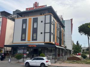 TAN OTEL