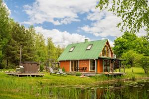 Namelis ant kranto - Alaušo Salos