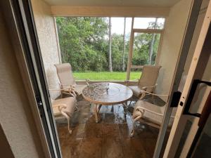 Gated Upscale 2BR Townhome - KING Bed, Pool, WiFi, Wash & Dry, AC, Private Patio facing preserves, Free Parking -- NICE FOR Medical, Business, Groups, Relo - by Moffitt Cancer CTR, Tampa Palms, Hunters Green, Live Oak, Cory Lake, New Tampa, Wesley Ch
