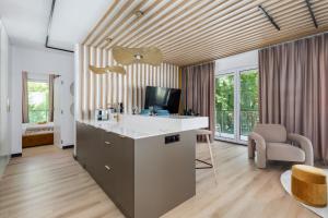 Family Apartment with a Sandbox on the Balcony in Kolobrzeg by Noclegi Renters