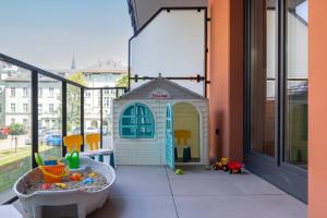 Family Apartment with a Sandbox on the Balcony in Kolobrzeg by Noclegi Renters