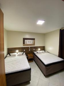 Flats próximo ao Shopping Singapura - pode descer com bebidas para o Park Aquático 1410