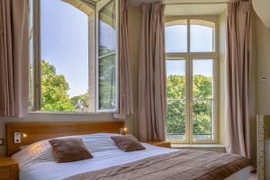 Hotels Hotel et SPA du Chateau : photos des chambres