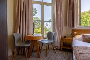 Hotels Hotel et SPA du Chateau : photos des chambres