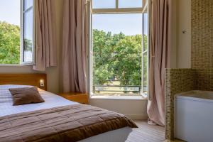 Hotels Hotel et SPA du Chateau : photos des chambres