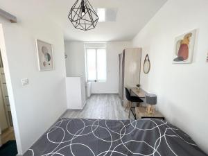 Appartements 180B - Duplex T2 Tout Confort - Wifi Netflix : photos des chambres