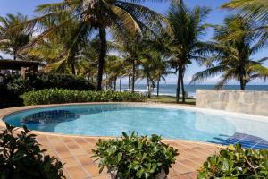 Casa pé na areia com garagem na Praia de Guarajuba