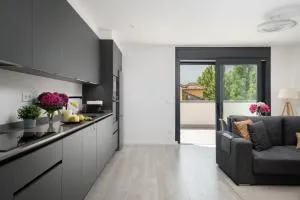 Ático en Llanes con gran terraza, piscina y pista de paddel - La Portilla