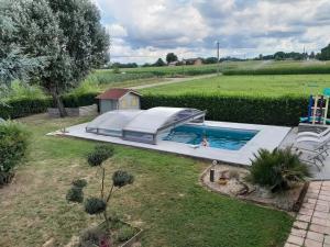 Sejours chez l'habitant DUO piscine partagee : photos des chambres