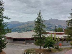 Duplex skis aux pieds, 2 pièces, 6 pers., Arc 1800, balcon sud-ouest - FR-1-411-886