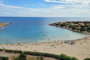 Appartements Magnifique T2 - Les pieds dans l'eau piscine/plage : photos des chambres