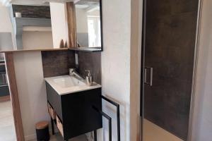 Appartements Le Cocon de lEspace Themis, piscine privee partagee : photos des chambres